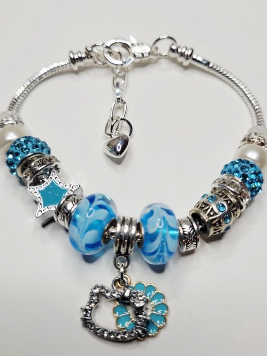 Hello Kitty Jewelry - NWT Hello Kitty Pandora Style Charm Bracelet Silver Color Aqua Blue Rhinestones